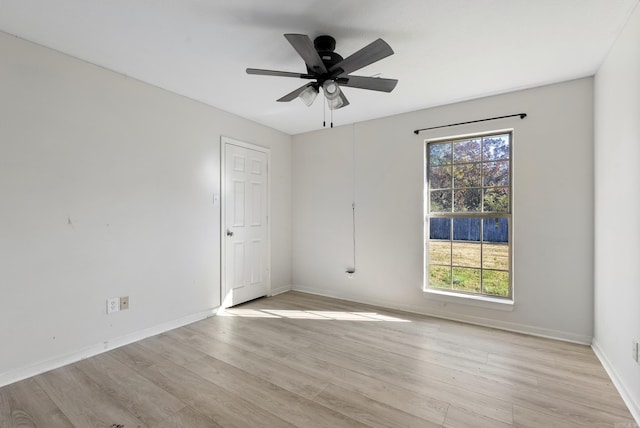 spare room with ceiling fan and light hardwood / wood-style floors