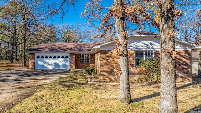 single story home featuring a garage