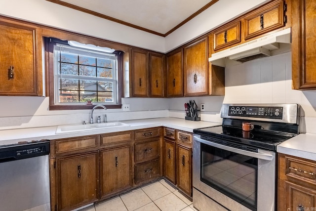 kitchen featuring sink, light tile patterned flooring, stainless steel appliances, and ornamental molding