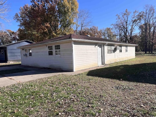 garage with a lawn