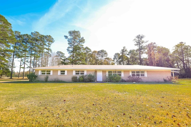 single story home featuring a front lawn