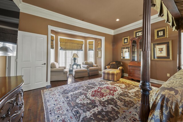 bedroom with dark hardwood / wood-style floors and crown molding