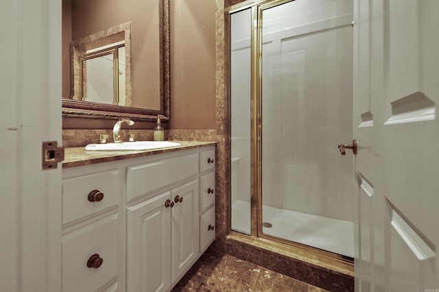 bathroom featuring vanity and walk in shower