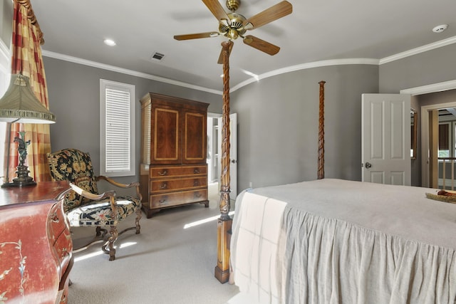 bedroom featuring ceiling fan, crown molding, and carpet