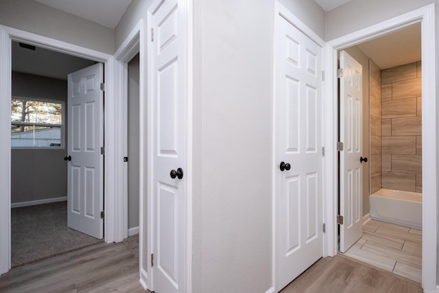 hall featuring light wood-type flooring