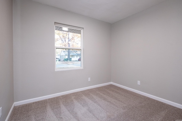 unfurnished room with carpet