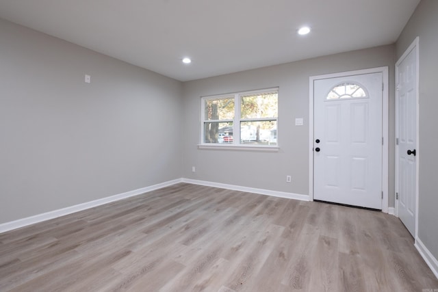 entrance foyer with light hardwood / wood-style flooring