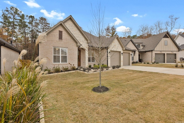 view of front of property featuring a front lawn and a garage