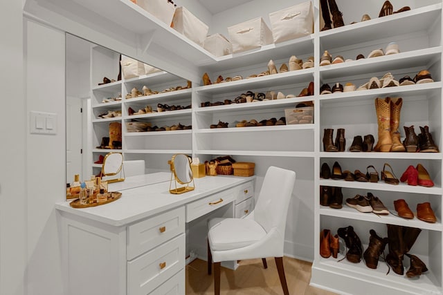 spacious closet with light wood-type flooring