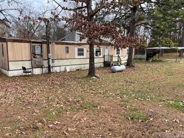 view of yard with a trampoline