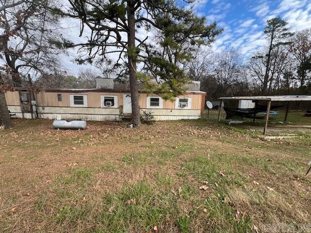 view of yard with a carport