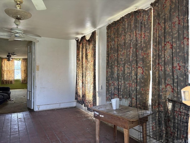 view of patio featuring a ceiling fan