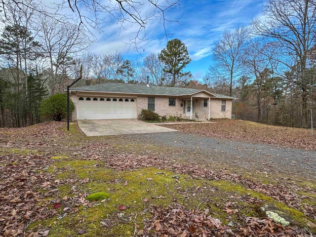 single story home featuring a garage