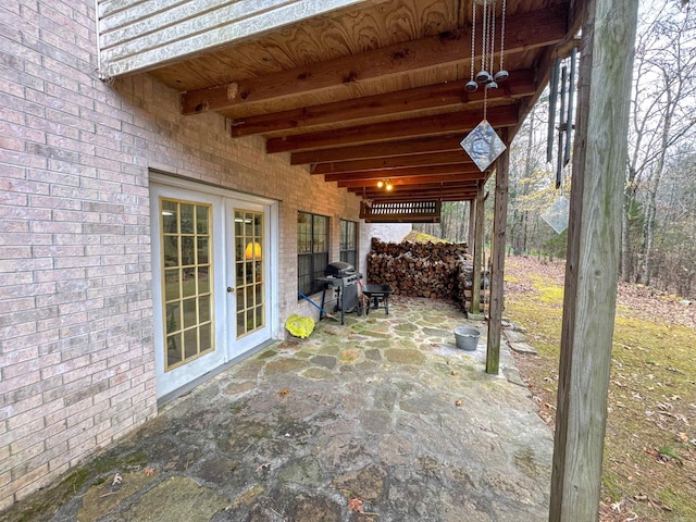 view of patio / terrace featuring grilling area and french doors