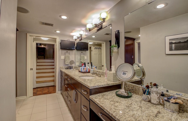 bathroom featuring tile patterned floors and vanity