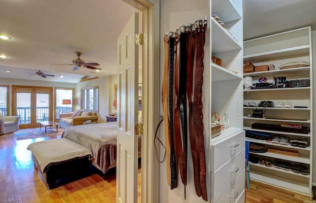 bedroom featuring ceiling fan and light wood-type flooring