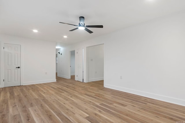 unfurnished room with light hardwood / wood-style flooring and ceiling fan