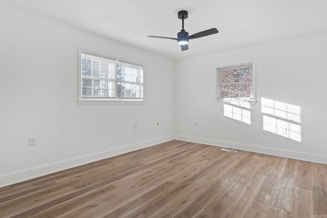 unfurnished room featuring ceiling fan and wood-type flooring