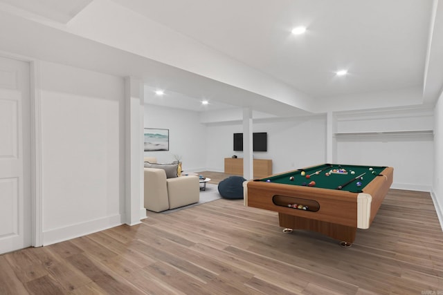 game room with wood-type flooring and pool table