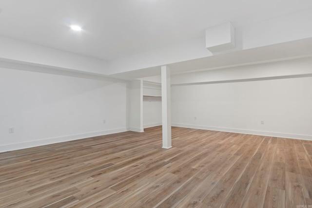 basement with light wood-type flooring