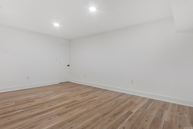 unfurnished room featuring light hardwood / wood-style flooring