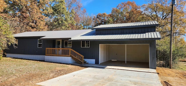 view of front of home featuring a carport