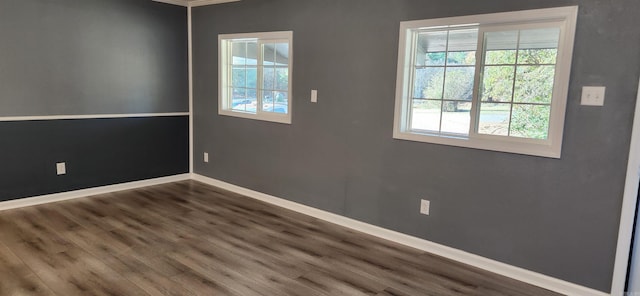 empty room featuring dark hardwood / wood-style floors