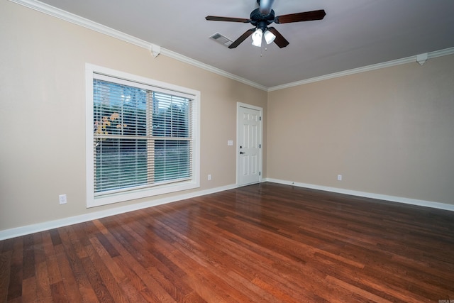 empty room featuring ceiling fan, dark wood-type flooring, and ornamental molding