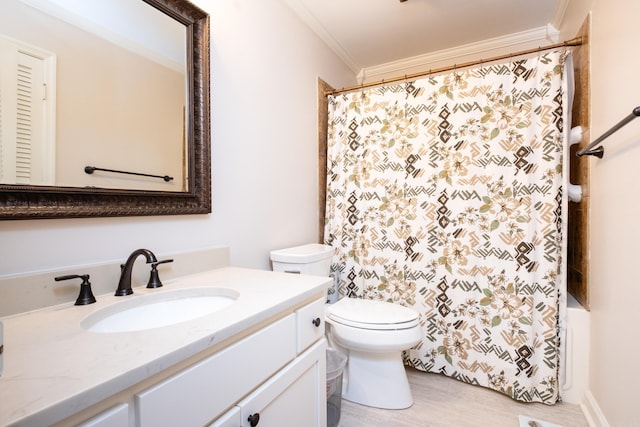 bathroom with wood-type flooring, vanity, toilet, and ornamental molding