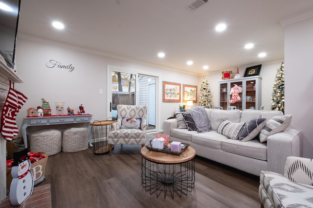 living room featuring dark hardwood / wood-style floors and crown molding