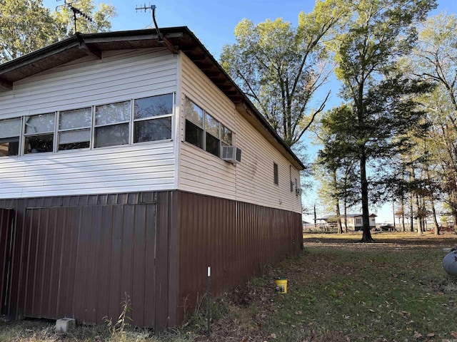 view of home's exterior with cooling unit