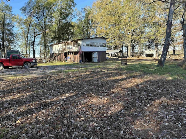 view of yard with a wooden deck