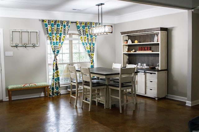 dining room with ornamental molding