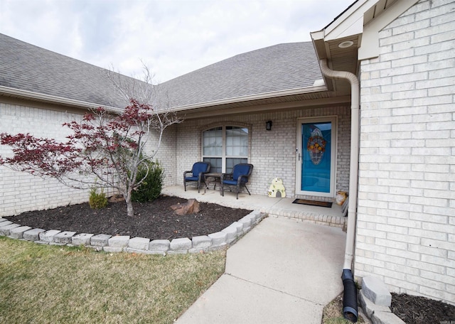 doorway to property featuring covered porch