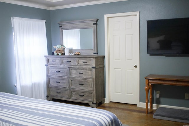 bedroom featuring crown molding