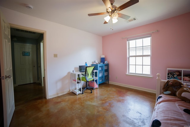 interior space with ceiling fan and concrete flooring