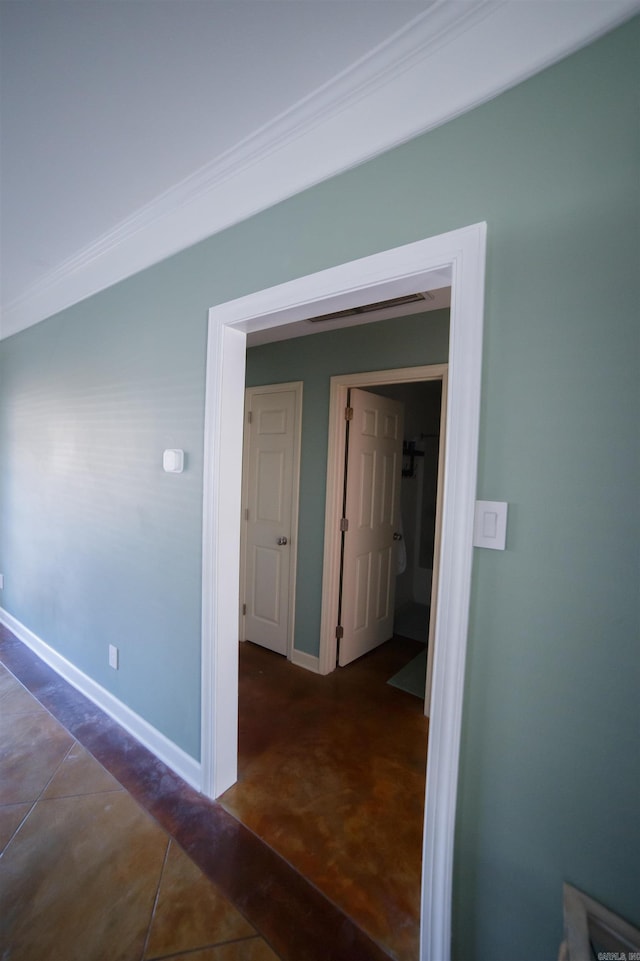 hallway with dark carpet