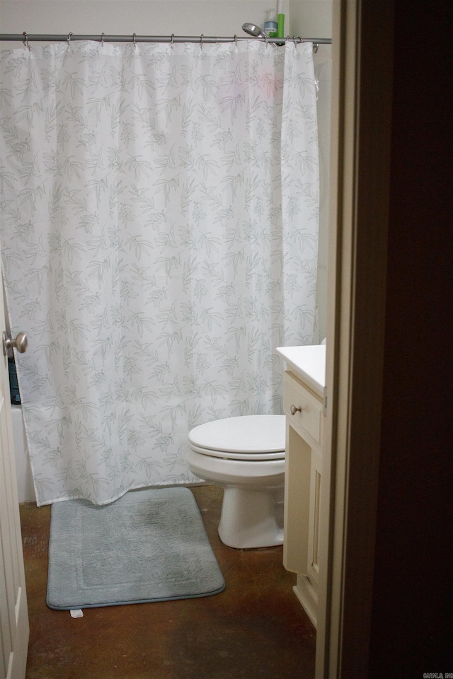 bathroom with vanity and toilet