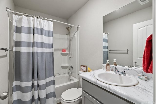 full bathroom with vanity, toilet, and shower / bath combo with shower curtain