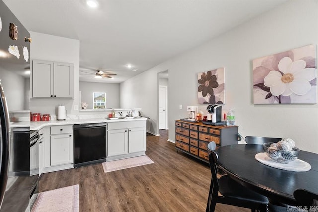 kitchen featuring kitchen peninsula, ceiling fan, sink, black dishwasher, and dark hardwood / wood-style floors