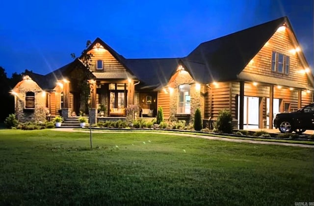 log cabin featuring a front lawn and a carport