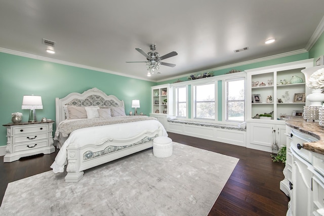 bedroom featuring ceiling fan, dark hardwood / wood-style floors, and ornamental molding