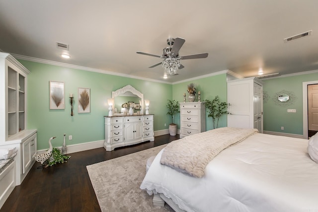 bedroom with ceiling fan, crown molding, and dark wood-type flooring