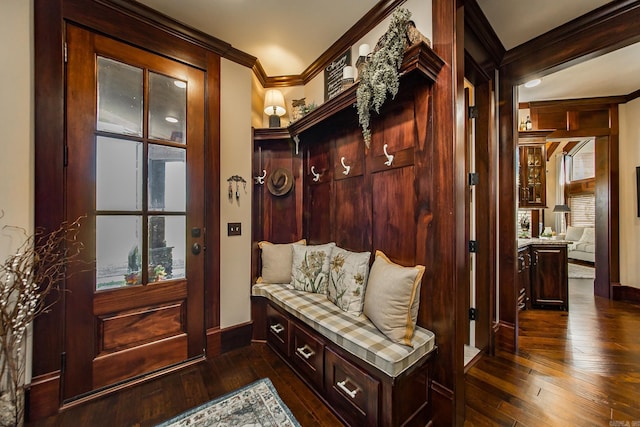 mudroom with crown molding and dark hardwood / wood-style floors