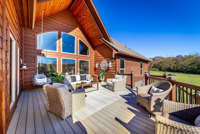 wooden terrace with outdoor lounge area