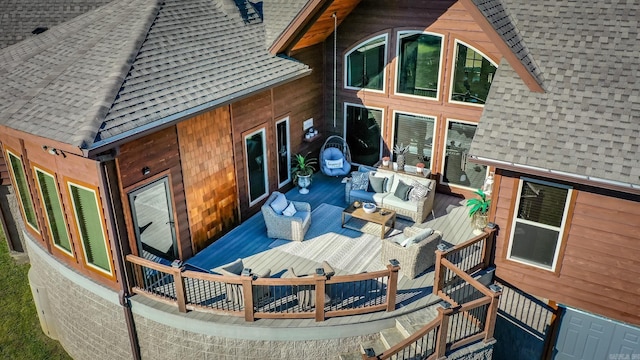 rear view of house with an outdoor hangout area