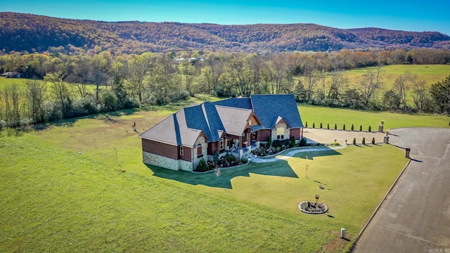 birds eye view of property featuring a mountain view