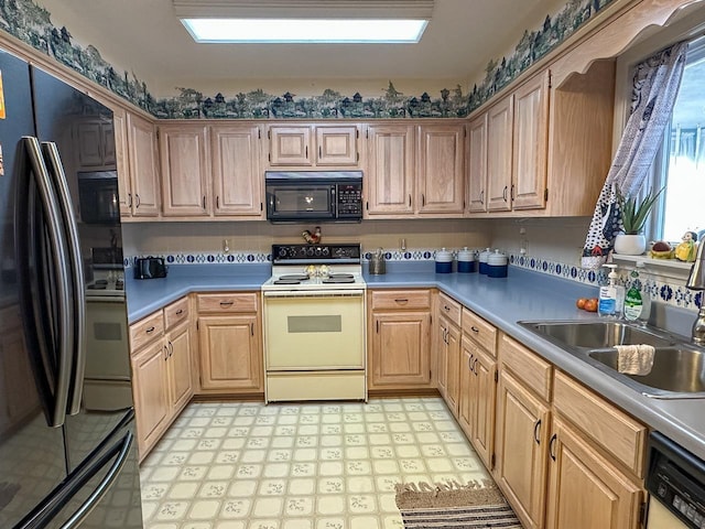 kitchen with sink and black appliances