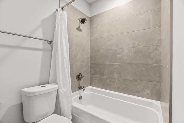 bathroom featuring toilet and shower / bathtub combination with curtain