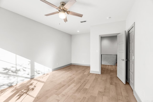 interior space featuring light wood-type flooring and ceiling fan